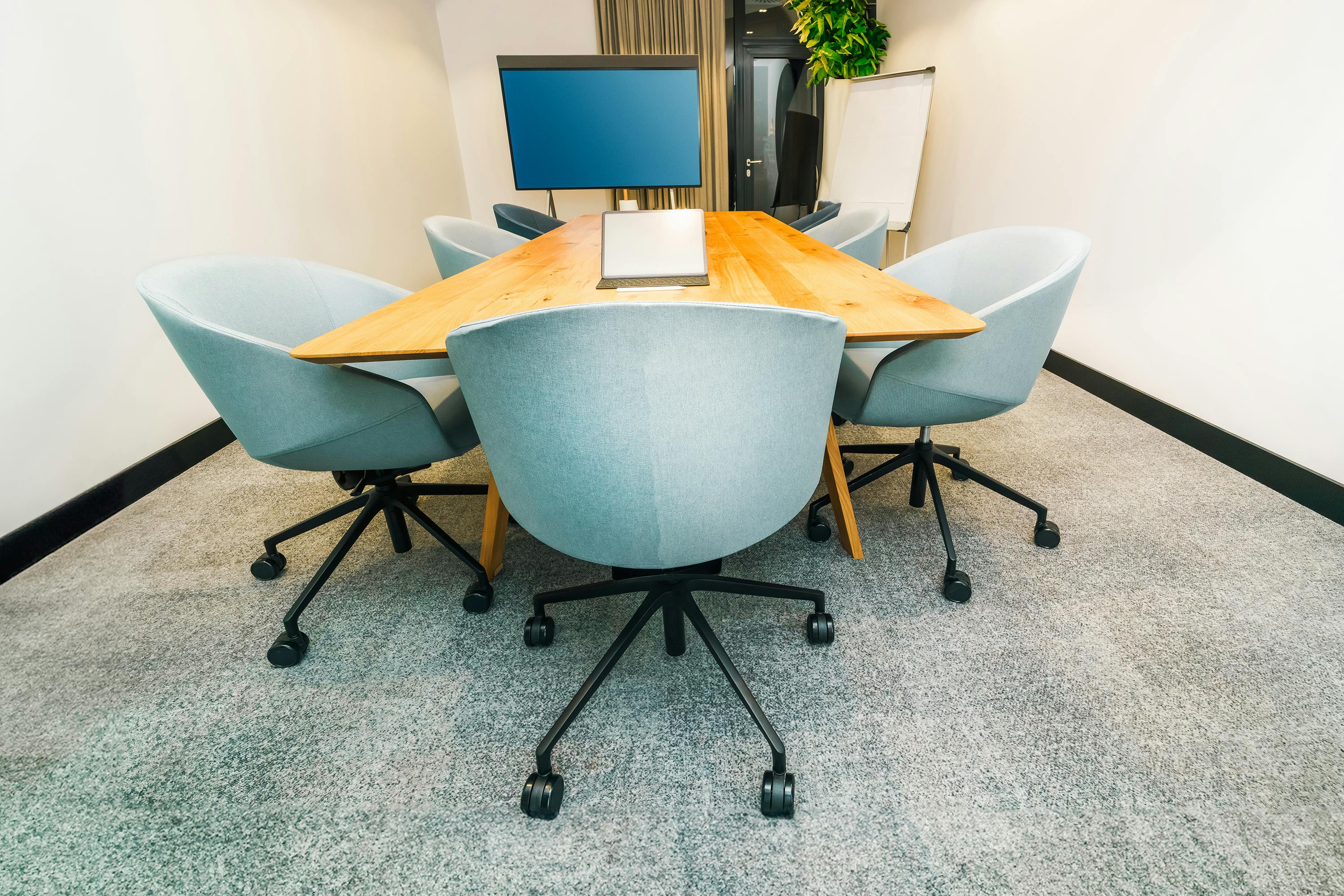 Quiet meeting room prepared for a business conversation